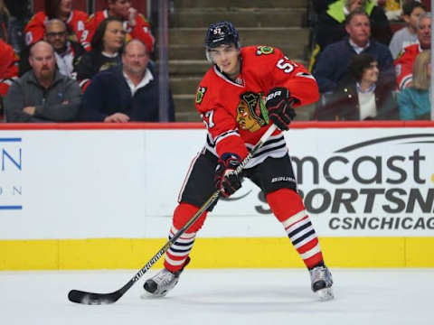 Feb 11, 2016; Chicago, IL, USA; Chicago Blackhawks defenseman Trevor van Riemsdyk (57) passes the puck during the second period against the Dallas Stars at the United Center. Mandatory Credit: Dennis Wierzbicki-USA TODAY Sports