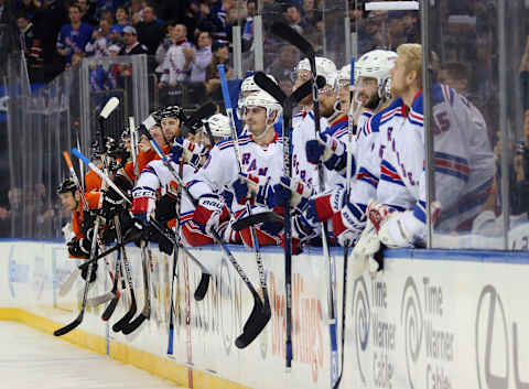 NEW YORK, NY – DECEMBER 22: The New York Rangers and the Anaheim Ducks salute players following a fight at Madison Square Garden on December 22, 2015 in New York City. The Rangers defeated the Ducks 3-2 in overtime. (Photo by Bruce Bennett/Getty Images)