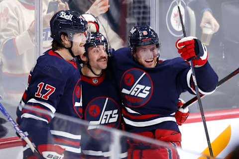 Winnipeg Jets, Adam Lowry (17), Andrew Copp (9), Nate Schmidt (88). Mandatory Credit: James Carey Lauder-USA TODAY Sports