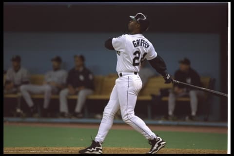 8 Oct 1995: Ken Griffey Jr. of the Seattle Mariners puts one in the air at the King Dome in Seattle, Washington during the game against the New York Yankees. The Mariners defeated the Yankees 6-5.