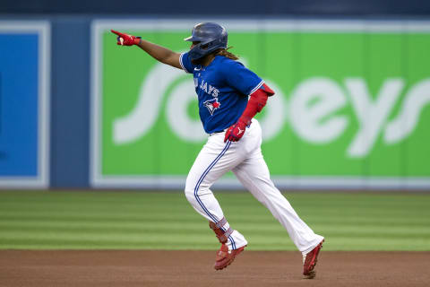 TORONTO, ON – SEPTEMBER 14: Vladimir Guerrero Jr. #27 of the Toronto Blue Jays runs out a solo home run, his 100th career home run, in the first inning of their MLB game against the Tampa Bay Rays at Rogers Centre on September 14, 2022 in Toronto, Canada. (Photo by Cole Burston/Getty Images)