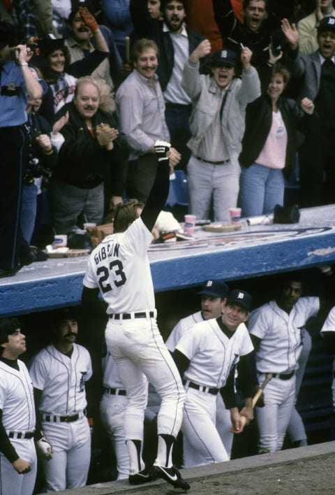 DETROIT, MI – OCTOBER 14, 1984: Outfielder Kirk Gibson #23 of the Detroit Tigers salutes the fans after hitting a three run homer off of Goose Gossage of the San Diego Padres in the bottom of the eighth inning of game five of the World Series October 14, 1984 at Tiger Stadium in Detroit, Michigan. The Tigers won the game 8-4 and won the series 4 games to 1. Gibson played for the Tigers from 1979-87. (Photo by Focus on Sport/Getty Images)