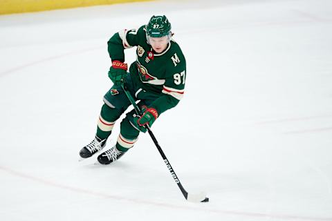 ST PAUL, MINNESOTA – APRIL 17: Kirill Kaprizov #97 of the Minnesota Wild controls the puck against the San Jose Sharks during the game at Xcel Energy Center on April 17, 2021, in St Paul, Minnesota. The Wild defeated the Sharks 5-2. (Photo by Hannah Foslien/Getty Images)