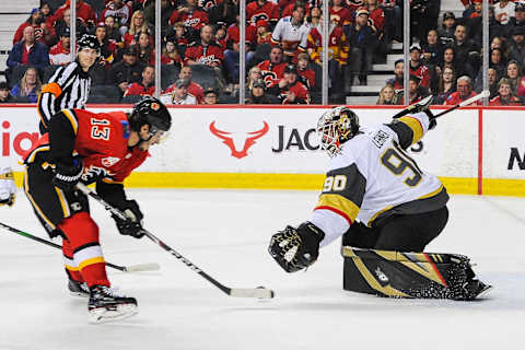 CALGARY, AB – MARCH 8: Johnny Gaudreau #13 of the Calgary Flames misses a shot on a breakaway on the net of Robin Lehner #90 of the Vegas Golden Knights during an NHL game at Scotiabank Saddledome on March 8, 2020 in Calgary, Alberta, Canada. (Photo by Derek Leung/Getty Images)