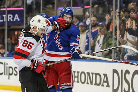 Devils right wing Timo Meier (96) and New York Rangers center Mika Zibanejad (93): Wendell Cruz-USA TODAY Sports