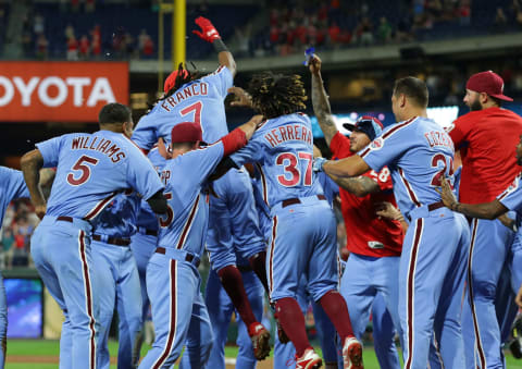 PHILADELPHIA, PA – AUGUST 2: Maikel Franco #7 of the Philadelphia Phillies celebrates with teammates after hitting a game winning walk-off three-run home run in the ninth inning during a game against the Miami Marlins at Citizens Bank Park on August 2, 2018 in Philadelphia, Pennsylvania. The Phillies won 5-2. (Photo by Hunter Martin/Getty Images)