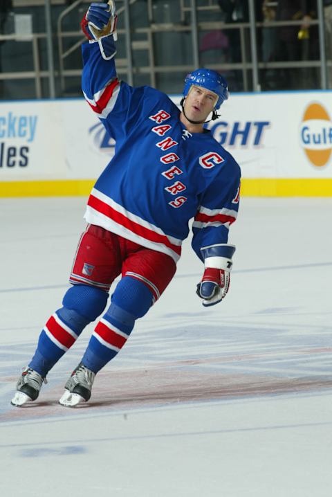 Mark Messier #11 of the New York Rangers celebrates after scoring an empty net goal as he passes Gordie Howe to become 2nd all time in NHL points (Photo by Bruce Bennett Studios via Getty Images Studios/Getty Images)