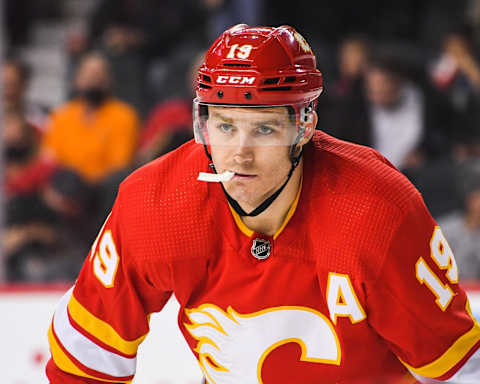 CALGARY, AB – DECEMBER 9: Matthew Tkachuk #19 of the Calgary Flames in action against the Carolina Hurricanes during an NHL game at Scotiabank Saddledome on December 9, 2021 in Calgary, Alberta, Canada. (Photo by Derek Leung/Getty Images)