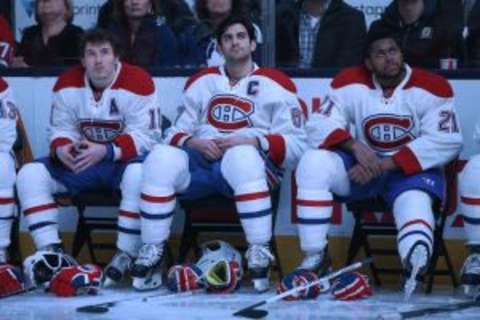 Jan 23, 2016; Toronto, Ontario, CAN; Montreal Canadiens right wing Brendan Gallagher (11), left wing Max Pacioretty (67), and right wing Devante Smith-Pelly (21) look on during a pre-game ceremony honoring Dave Keon (not pictured) against the Toronto Maple Leafs at Air Canada Centre. The Canadiens won 3-2. Mandatory Credit: Tom Szczerbowski-USA TODAY Sports