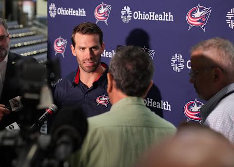 COLUMBUS, OHIO – SEPTEMBER 18: Boone Jenner #38 of the Columbus Blue Jackets addresses members of the media during media day at Nationwide Arena on September 18, 2023 in Columbus, Ohio. (Photo by Jason Mowry/Getty Images)