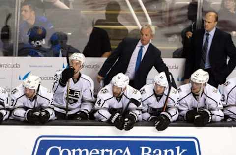 Oct 12, 2016; San Jose, CA, USA; Los Angeles Kings head coach Darryl Sutter watches the game against the San Jose Sharks in the second period at SAP Center at San Jose. Mandatory Credit: John Hefti-USA TODAY Sports