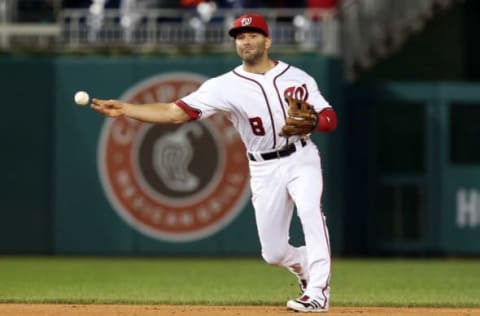 Oct 1, 2016; Washington, DC, USA; Washington Nationals shortstop Danny Espinosa (8) makes a throw to first base against the Miami Marlins in the ninth inning at Nationals Park. The Nationals won 2-1. Mandatory Credit: Geoff Burke-USA TODAY Sports