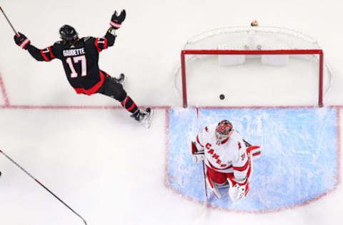 OTTAWA, ONTARIO – JANUARY 27: Adam Gaudette #17 of the Ottawa Senators celebrates after Frederik Andersen #31 of the Carolina Hurricanes is scored on during the first period at Canadian Tire Centre on January 27, 2022, in Ottawa, Ontario. (Photo by Chris Tanouye/Getty Images)