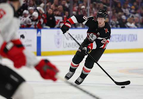 Mar 24, 2023; Buffalo, New York, USA; Buffalo Sabres defenseman Rasmus Dahlin (26) looks to make a pass during the second period against the New Jersey Devils at KeyBank Center. Mandatory Credit: Timothy T. Ludwig-USA TODAY Sports