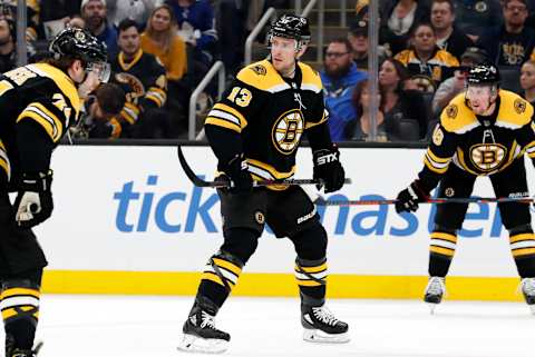 BOSTON, MA – OCTOBER 22: Boston Bruins center Charlie Coyle (13) checks his back line before a face off during a game between the Boston Bruins and the Toronto Maple Leafs on October 22, 2019, at TD Garden in Boston, Massachusetts. (Photo by Fred Kfoury III/Icon Sportswire via Getty Images)