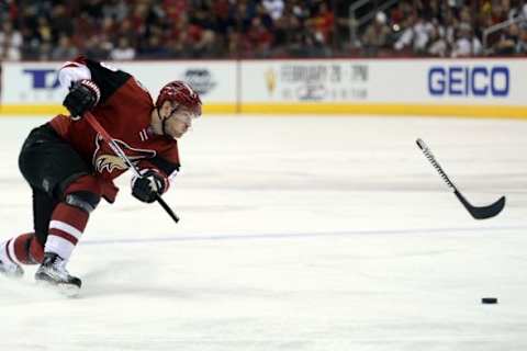 Feb 4, 2016; Glendale, AZ, USA; Arizona Coyotes left wing Mikkel Boedker (89) breaks his stick on a shot attempt against the Chicago Blackhawks during the second period at Gila River Arena. Mandatory Credit: Joe Camporeale-USA TODAY Sports