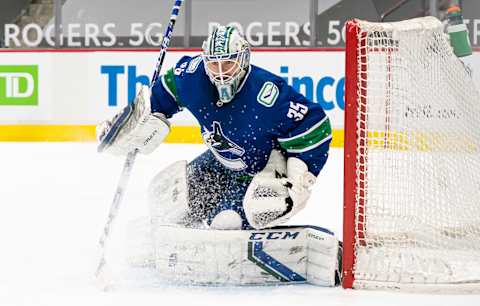 VANCOUVER, BC – MARCH 22: Goalie Thatcher Demko #35 of the Vancouver Canucks readies to make a save during NHL action. (Photo by Rich Lam/Getty Images)