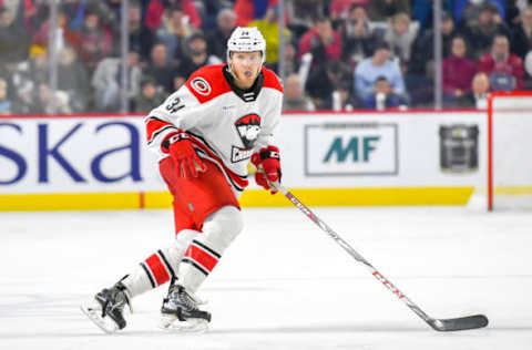 LAVAL, QC, CANADA – DECEMBER 28: Josh Wesley #34 of the Charlotte Checkers looking to defend his zone against the Laval Rocket at Place Bell on December 28, 2018 in Laval, Quebec. (Photo by Stephane Dube /Getty Images)