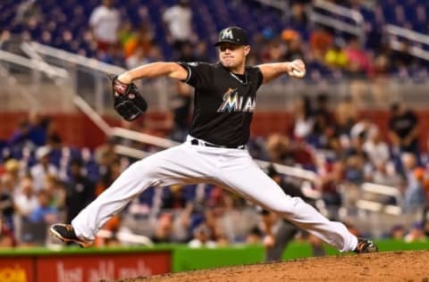 Sep 27, 2016; Miami, FL, USA; Miami Marlins relief pitcher Mike Dunn (40) throws during the seventh inning against New York Mets at Marlins Park. Mandatory Credit: Steve Mitchell-USA TODAY Sports