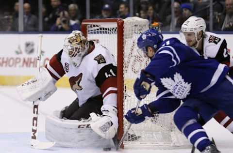 NHL Power Rankings: Arizona Coyotes goaltender Mike Smith (41) makes a save on a wrap around attempt by Toronto Maple Leafs forward Zach Hyman (11) at Air Canada Centre. Arizona defeated Toronto 3-2 in an overtime shootout. Mandatory Credit: John E. Sokolowski-USA TODAY Sports