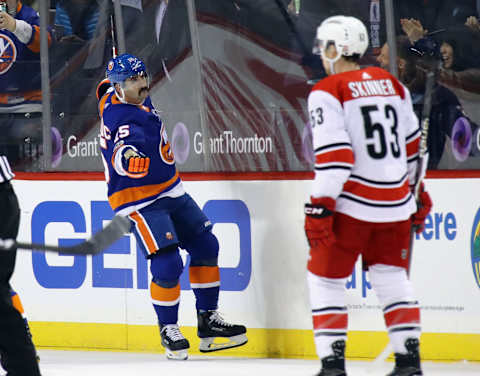 NEW YORK, NY – NOVEMBER 16: Cal Clutterbuck #15 of the New York Islanders celebrates his shorthanded goal at 16:57 of the first period against the Carolina Hurricanes at the Barclays Center on November 16, 2017 in the Brooklyn borough of New York City. (Photo by Bruce Bennett/Getty Images)