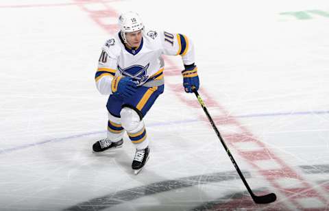 NEWARK, NEW JERSEY – MARCH 16: Henri Jokiharju #10 of the Buffalo Sabres skates against the New Jersey Devils at the Prudential Center on March 16, 2021 in Newark, New Jersey. (Photo by Bruce Bennett/Getty Images)