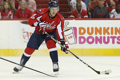 Apr 15, 2017; Washington, DC, USA; Washington Capitals defenseman Dmitry Orlov (9) passes the puck against the Toronto Maple Leafs in game two of the first round of the 2017 Stanley Cup Playoffs at Verizon Center. Mandatory Credit: Geoff Burke-USA TODAY Sports