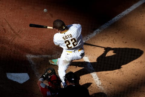 SAN DIEGO, CALIFORNIA – OCTOBER 19: Juan Soto #22 of the San Diego Padres hits a one-run RBI double during the fifth inning against the Philadelphia Phillies in game two of the National League Championship Series at PETCO Park on October 19, 2022 in San Diego, California. (Photo by Sean M. Haffey/Getty Images)