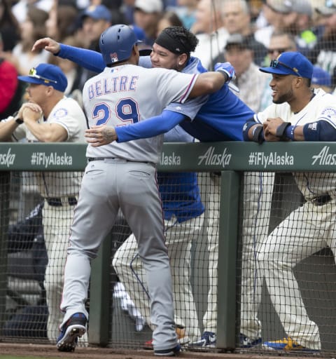 SEATTLE, WA – SEPTEMBER 30: Adrian Beltre #29 of the Texas Rangers gets a hug from Felix Hernandez #34 of the Seattle Mariners during the second inning of a game at Safeco Field on September 30, 2018 in Seattle, Washington. (Photo by Stephen Brashear/Getty Images)