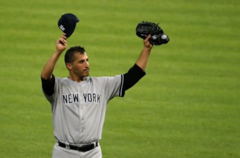 HOUSTON, TX – SEPTEMBER 28: Andy Pettitte #46 of the New York Yankees celebrates after pitching his last game and defeating the Houston Astros 2-1 at Minute Maid Park on September 28, 2013 in Houston, Texas. (Photo by Scott Halleran/Getty Images)