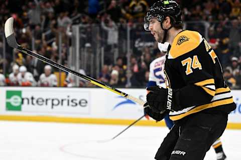 BOSTON, MASSACHUSETTS – DECEMBER 13: Jake DeBrusk #74 of the Boston Bruins reacts after scoring a goal against the New York Islanders during the first period at the TD Garden on December 13, 2022, in Boston, Massachusetts. (Photo by Brian Fluharty/Getty Images)