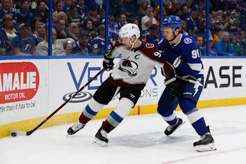 TAMPA, FL – DECEMBER 08: Colorado Avalanche left wing Gabriel Landeskog (92) is defended by Tampa Bay Lightning defenseman Mikhail Sergachev (98) in the third period of the NHL game between the Colorado Avalanche and Tampa Bay Lightning on December 08, 2018 at Amalie Arena in Tampa,FL. (Photo by Mark LoMoglio/Icon Sportswire via Getty Images)