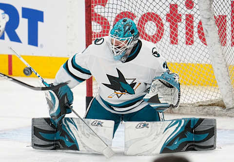 Nov 30, 2022; Toronto, Ontario, CAN; San Jose Sharks goaltender Aaron Dell (30) makes a save during warm up before a game against the Toronto Maple Leafs at Scotiabank Arena. Mandatory Credit: John E. Sokolowski-USA TODAY Sports