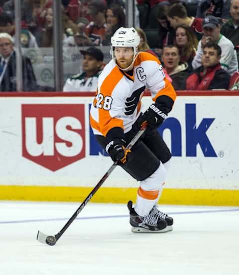 Jan 7, 2016; Saint Paul, MN, USA; Philadelphia Flyers forward Claude Giroux (28) carries the puck during the second period against the Minnesota Wild at Xcel Energy Center. Mandatory Credit: Brace Hemmelgarn-USA TODAY Sports