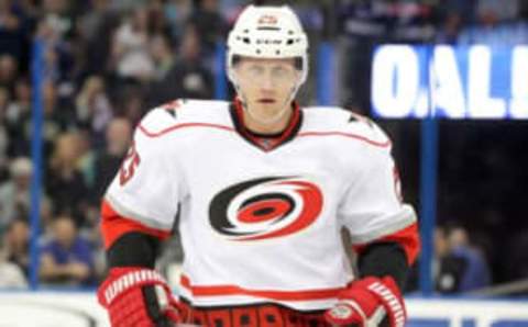 March 16, 2013; Tampa FL, USA; Carolina Hurricanes defenseman Joni Pitkanen (25) against the Tampa Bay Lightning during the first period at Tampa Times Forum. Mandatory Credit: Kim Klement-USA TODAY Sports