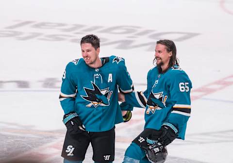 SAN JOSE, CA – APRIL 23: San Jose Sharks center Logan Couture (39) and San Jose Sharks defenseman Erik Karlsson (65) enjoying the moment after winning Game 7, Round 1 between the Vegas Golden Knights and the San Jose Sharks on Tuesday, April 23, 2019 at the SAP Center in San Jose, California. (Photo by Douglas Stringer/Icon Sportswire via Getty Images)