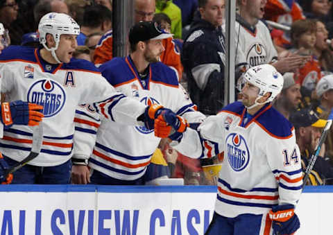 NHL Power Rankings: Edmonton Oilers right wing Jordan Eberle (14) celebrates his goal against the Buffalo Sabres with left wing Milan Lucic (27) during the second period at KeyBank Center. Mandatory Credit: Kevin Hoffman-USA TODAY Sports