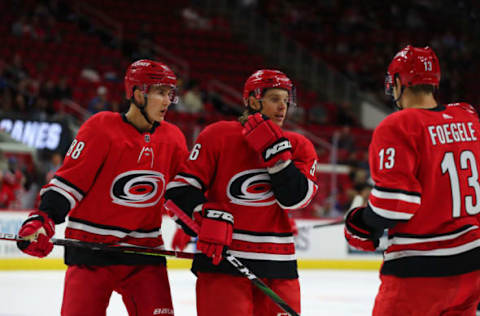 RALEIGH, NC – SEPTEMBER 18: Carolina Hurricanes center Martin Necas (88), Carolina Hurricanes left wing Erik Haula (56), and Carolina Hurricanes left wing Warren Foegele (13) during the 1st period of the Carolina Hurricanes game versus the Tampa Bay Lightning on September 18th, 2019 at PNC Arena in Raleigh, NC. (Photo by Jaylynn Nash/Icon Sportswire via Getty Images)