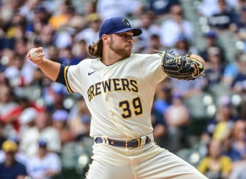 Aug 18, 2022; Milwaukee, Wisconsin, USA; Milwaukee Brewers pitcher Corbin Burnes (39) throws a pitch in the first inning against the Los Angeles Dodgers at American Family Field. Mandatory Credit: Benny Sieu-USA TODAY Sports