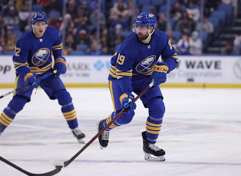 Dec 29, 2021; Buffalo, New York, USA; Buffalo Sabres right wing Alex Tuch (89) carries the puck and looks to make a pass during the second period against the New Jersey Devils at KeyBank Center. Mandatory Credit: Timothy T. Ludwig-USA TODAY Sports