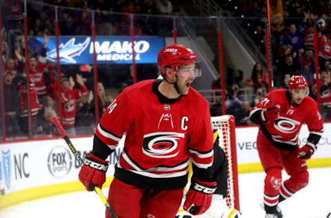 RALEIGH, NC – MARCH 19: Justin Williams #14 of the Carolina Hurricanes scores the game tying goal in regulation during an NHL game against the Pittsburgh Penguins on March 19, 2019 at PNC Arena in Raleigh, North Carolina. (Photo by Gregg Forwerck/NHLI via Getty Images)