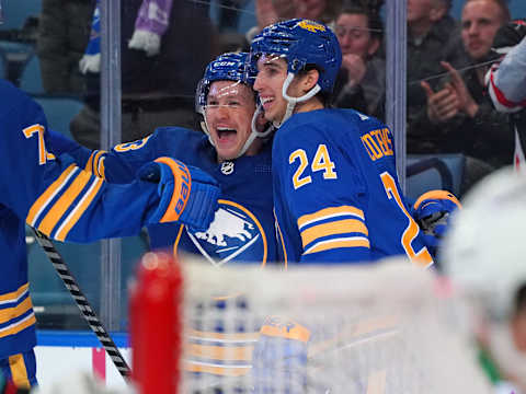 BUFFALO, NY – NOVEMBER 29: Jeff Skinner #53 of the Buffalo Sabres celebrates his goal with Dylan Cozens #24 during the second period against the Seattle Kraken at KeyBank Center on November 29, 2021 in Buffalo, New York. (Photo by Kevin Hoffman/Getty Images)