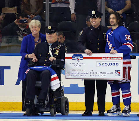 Mats Zuccarello #36 of the New York Rangers is awarded the Steven McDonald Award (Photo by Bruce Bennett/Getty Images)