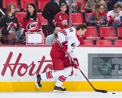 DETROIT, MI – FEBRUARY 24: Victor Rask #49 of the Carolina Hurricanes skates with a puck during warm-ups prior to an NHL game against the Detroit Red Wings at Little Caesars Arena on February 24, 2018 in Detroit, Michigan. (Photo by Dave Reginek/NHLI via Getty Images)