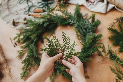 Making wreaths is an easy way to repurpose a Christmas tree.