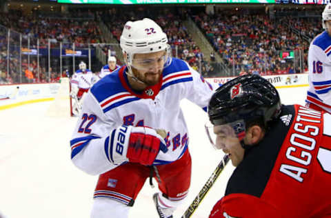 NEWARK, NJ – APRIL 01: New York Rangers defenseman Kevin Shattenkirk (22) battles with New Jersey Devils left wing Kenny Agostino (17) during the National Hockey League game between the New Jersey Devils and the New York Rangers on April 1, 2019 at the Prudential Center in Newark, NJ. (Photo by Rich Graessle/Icon Sportswire via Getty Images)