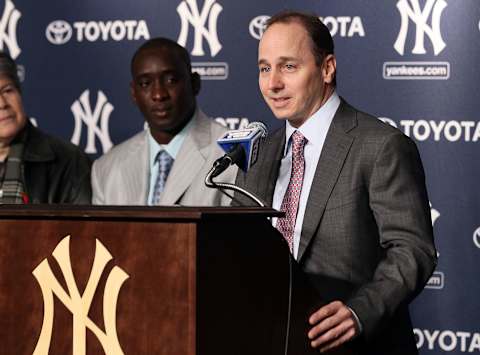 NEW YORK, NY – JANUARY 19: General manager Brian Cashman (R) of the New York Yankees speaks during a press conference as Rafael Soriano looks on on January 19, 2011 at Yankee Stadium in the Bronx borough of New York City. The Yankees signed Soriano to a three year contract. (Photo by Jim McIsaac/Getty Images)