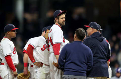 CLEVELAND, OH – APRIL 25: Cleveland Indians pitcher Andrew Miller (24) talks to Cleveland Indians manager Terry Francona (77) and a trainer after he suffered left hamstring tightness during the seventh inning of the Major League Baseball Interleague game between the Chicago Cubs and Cleveland Indians on April 25, 2018, at Progressive Field in Cleveland, OH. (Photo by Frank Jansky/Icon Sportswire via Getty Images)