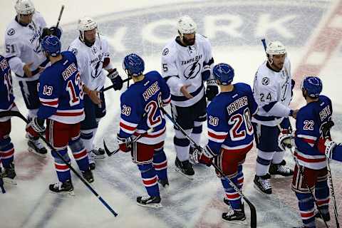 NEW YORK, NY – MAY 29: The New York Rangers shake hands with the Tampa Bay Lightning after the Lighting defeated the Ranges by a score of 2-0 in Game Seven of the Eastern Conference Finals during the 2015 NHL Stanley Cup Playoffs at Madison Square Garden on May 29, 2015 in New York City. (Photo by Elsa/Getty Images)