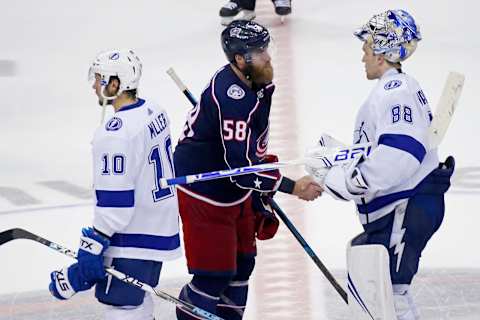 J.T. Miller #10, Tampa Bay Lightning, David Savard #58, Columbus Blue Jackets, Andrei Vasilevskiy #88, Tampa Bay Lightning (Photo by Kirk Irwin/Getty Images)